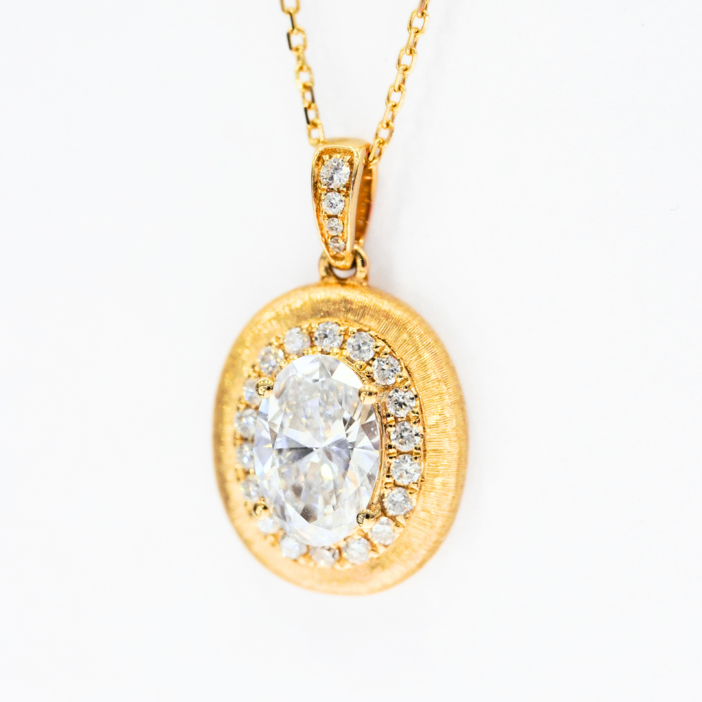 Oval-cut lab diamond pendant in 18k gold