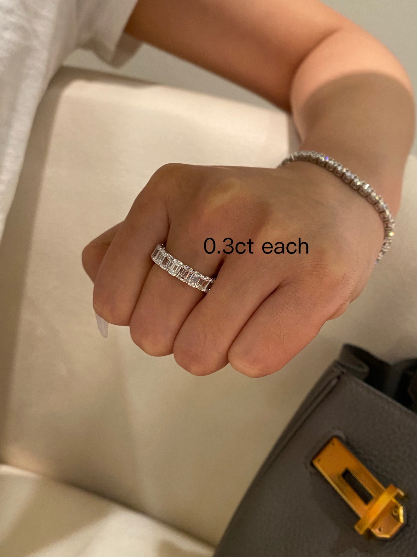 Stackable emerald cut diamond eternity band