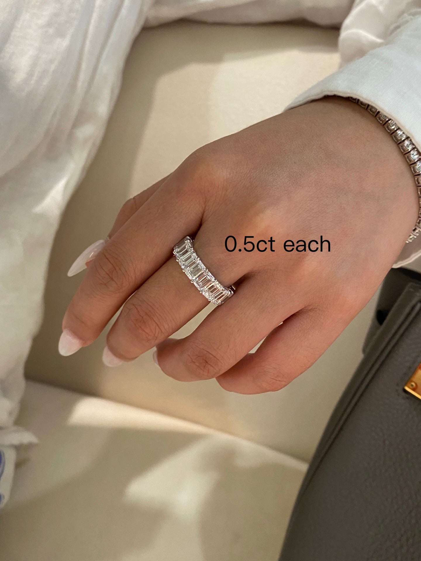 Lab-grown emerald cut diamond eternity ring