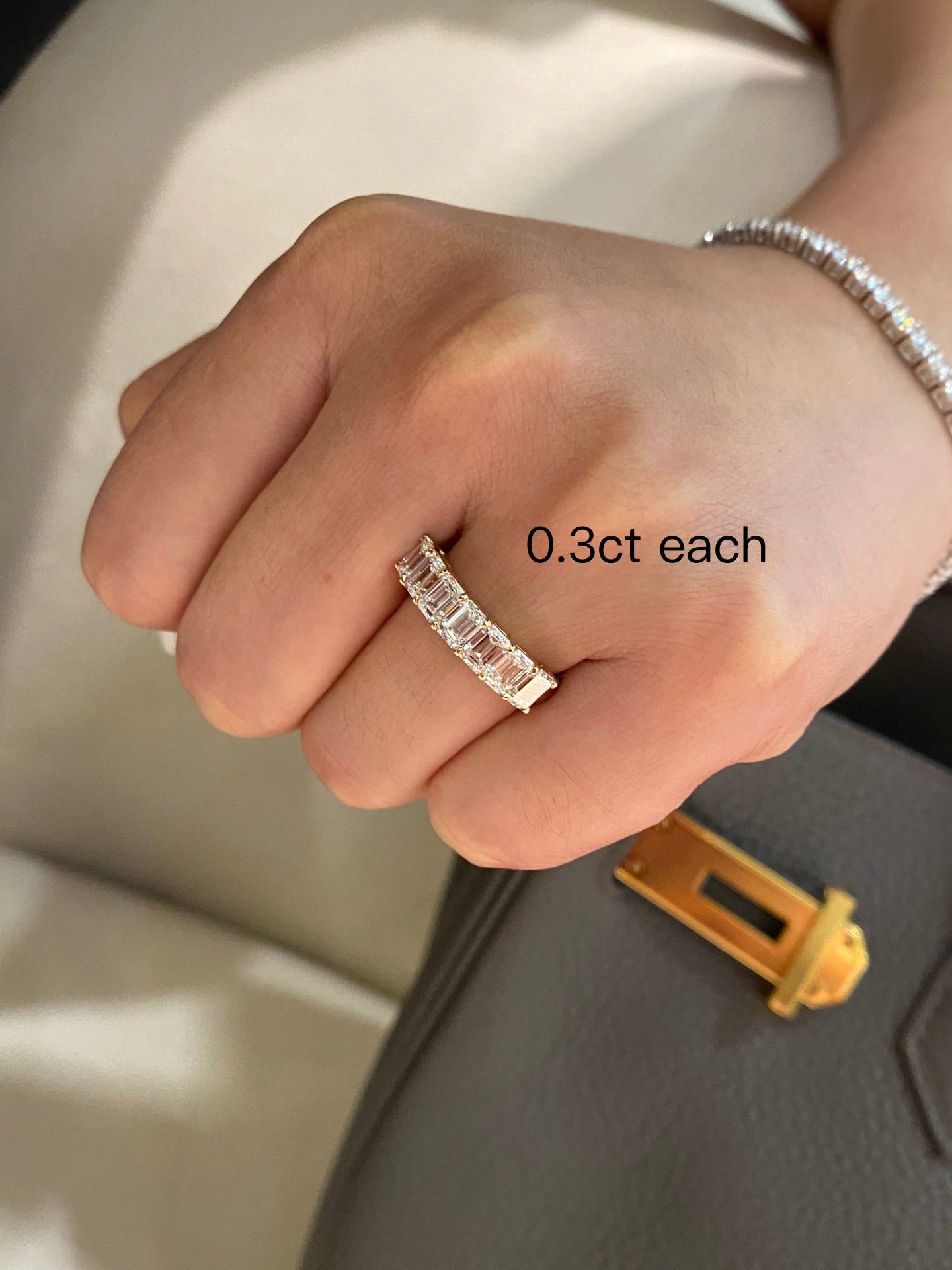 Emerald cut diamond half eternity ring 0.3ct each