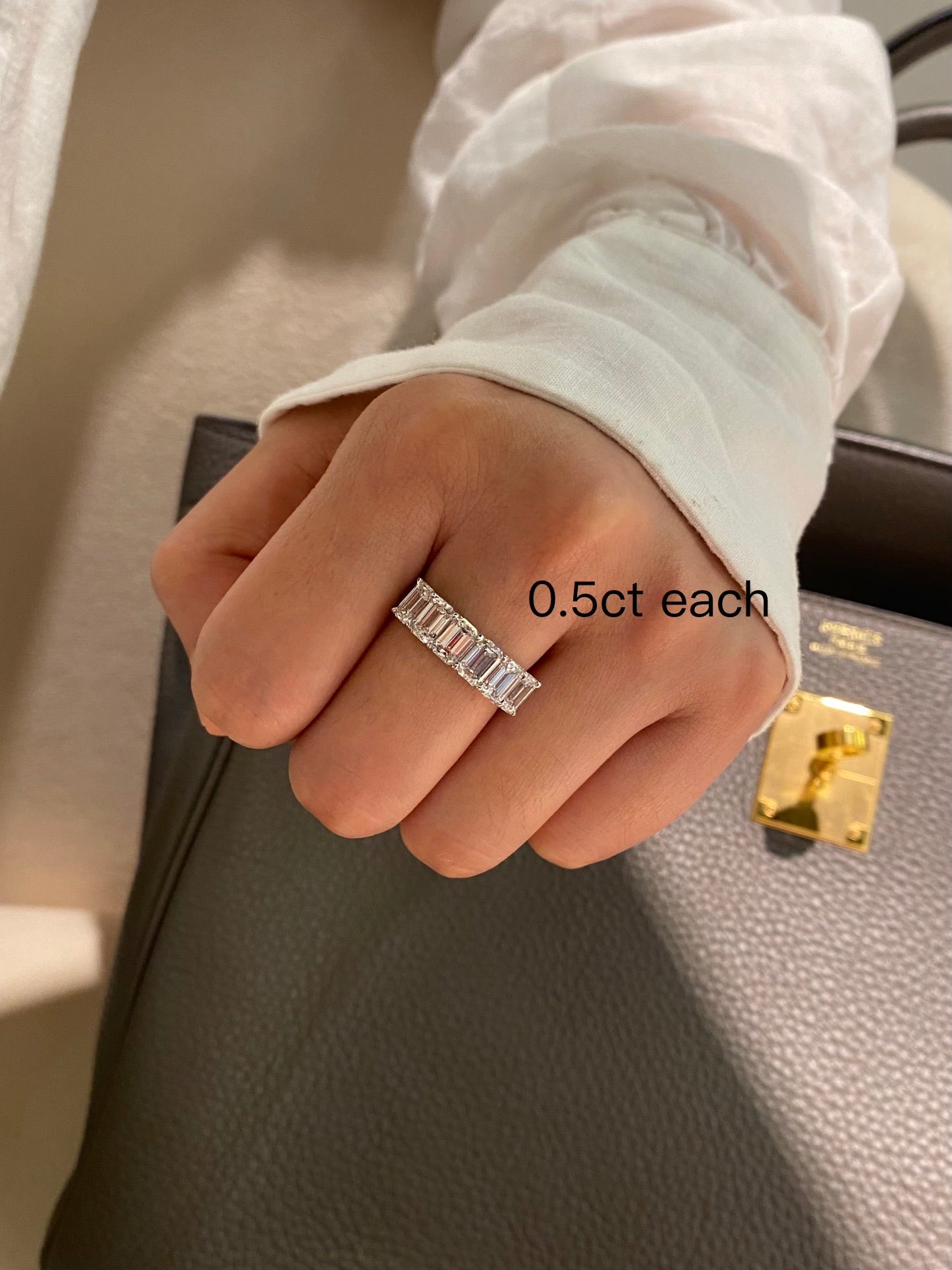 Emerald cut diamond half eternity ring 0.5ct each