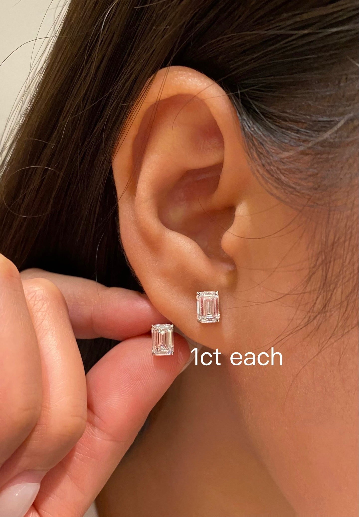 Platinum emerald cut diamond earrings