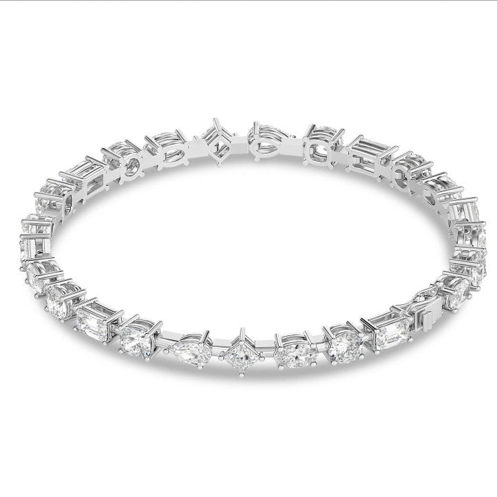 Unique cut diamond tennis bracelet in white gold