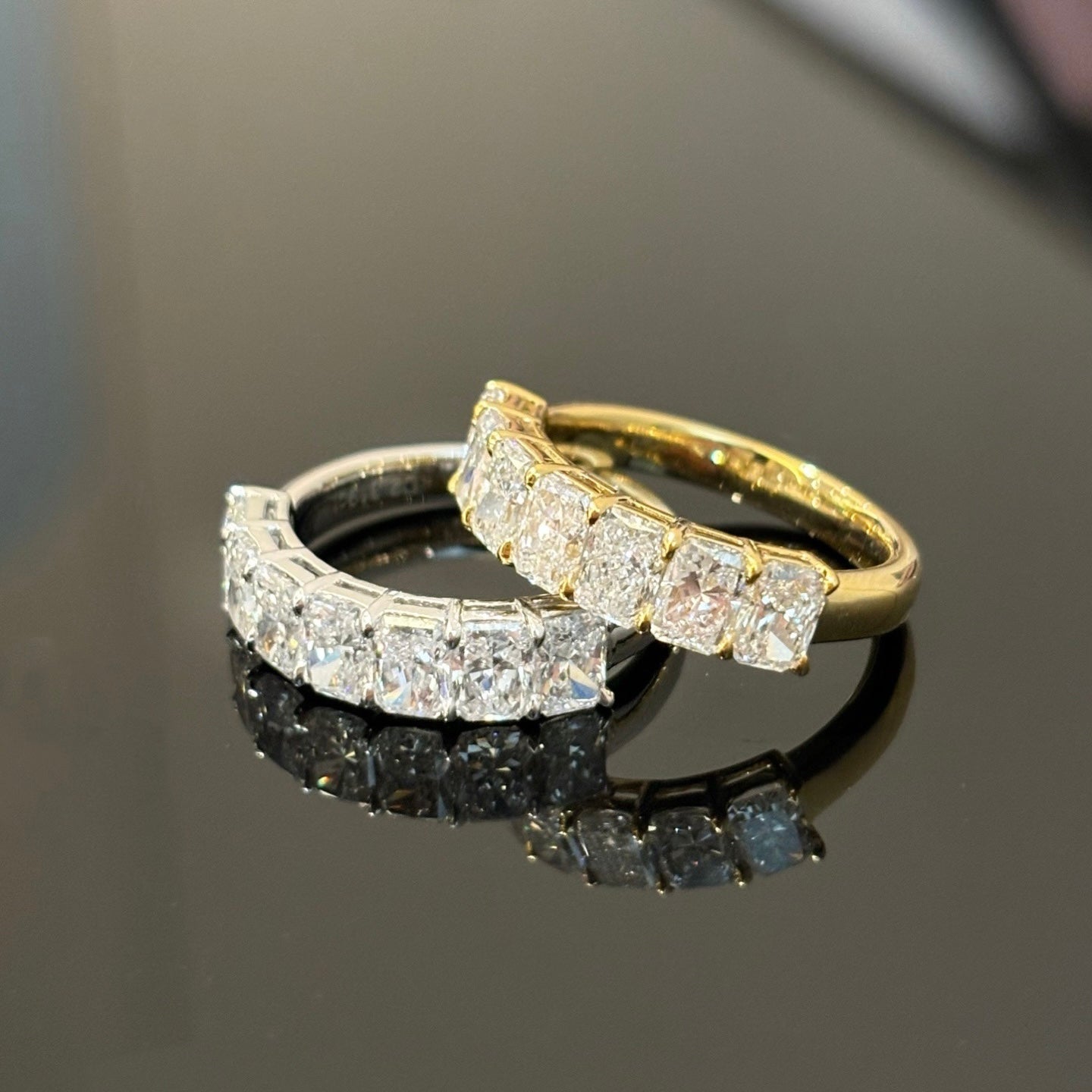 Sparkling half eternity band with radiant cut diamonds