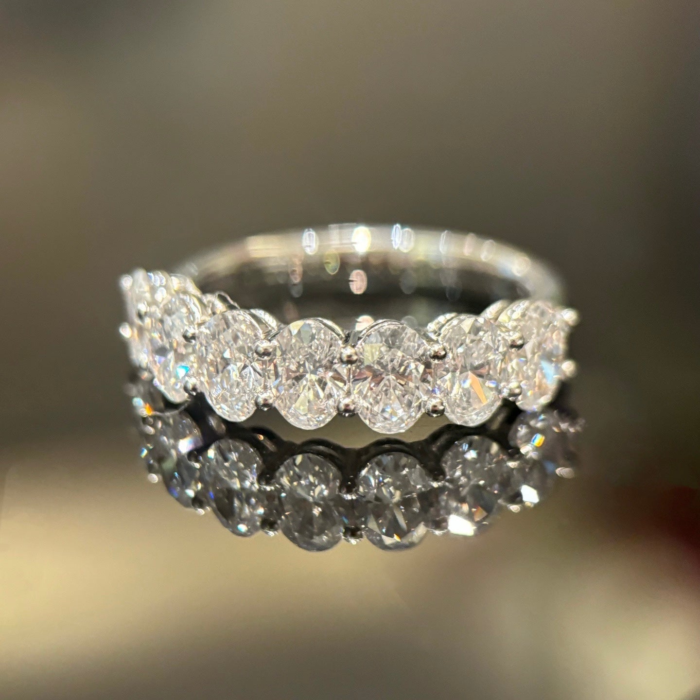 Sparkling oval cut diamond band